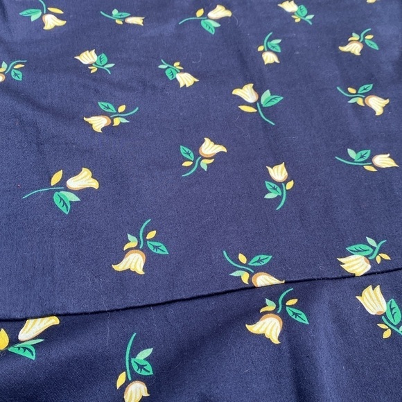 Draper James navy floral sleeveless dress with ruffled hem. - Picture 3 of 12